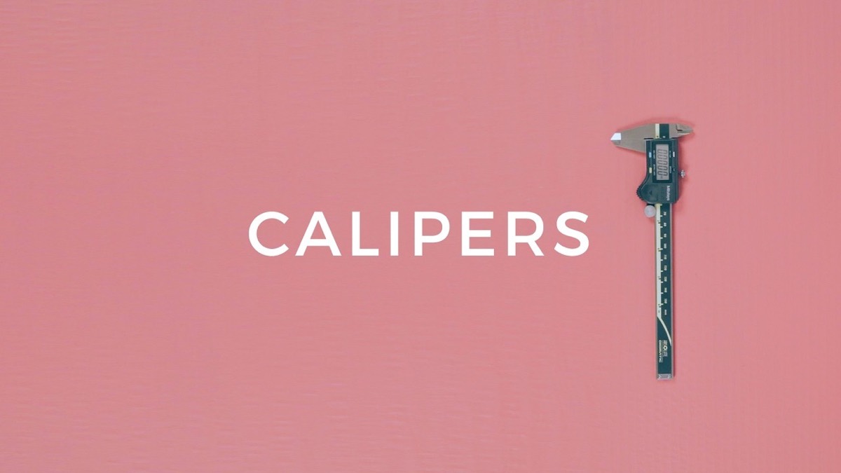 Calipers on pink under the word CALIPERS